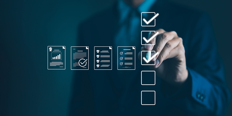 A technician monitors a digital color control dashboard in a modern press room, showcasing smart color automation tools like MeasureColor for compliance audits and margin protection.